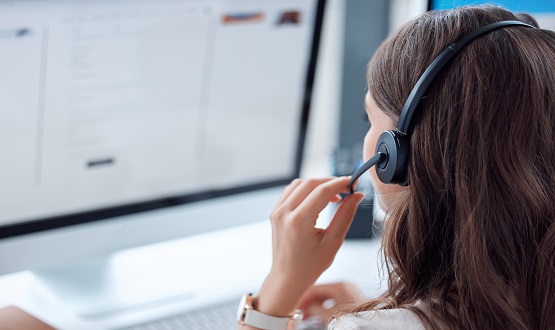 Smybolbild: Frau mit Headset